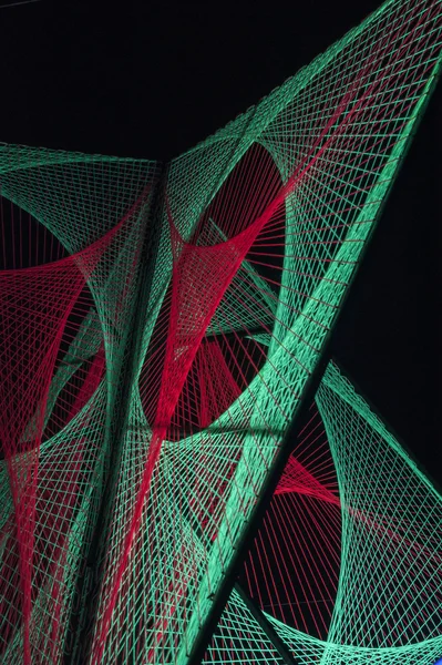 Red and green lights created 3D formation in black background — Stock Photo, Image