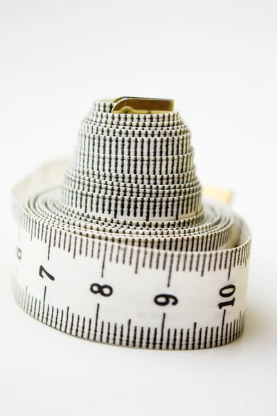 Fita métrica ou centímetro isolado sobre branco — Fotografia de Stock