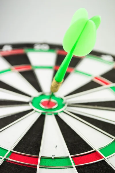Colorful darts hitting a target, isolated on white — Stock Photo, Image