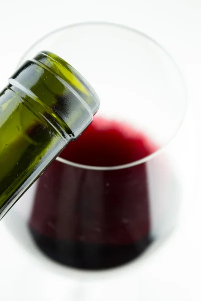Red wine being poured into a glass — Stock Photo, Image