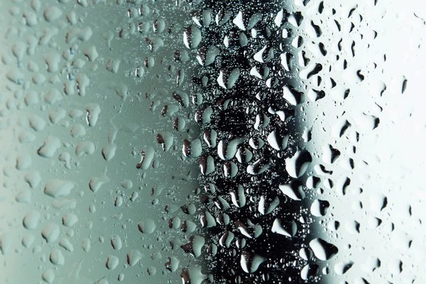 Close up of water drops on glass surface — Stock Photo, Image