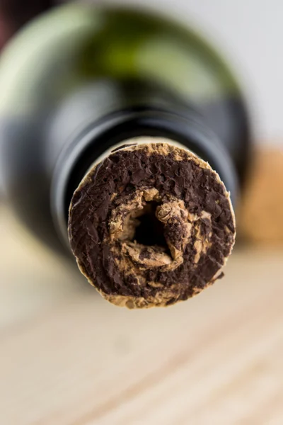 Close-up of old wine bottle with a cork — Stock Photo, Image