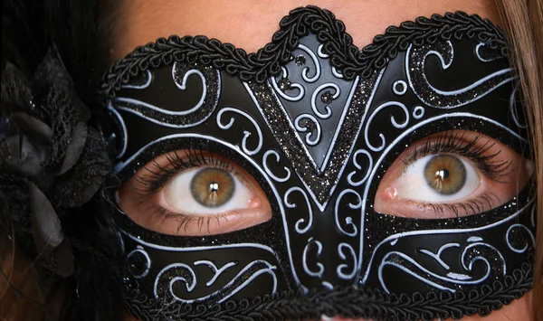 Photo of a young woman wearing mask — Stock Photo, Image