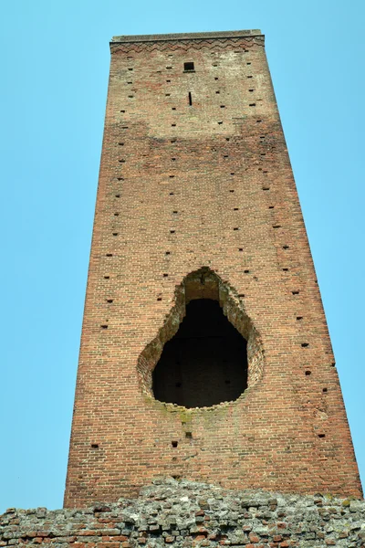 Ancient medieval tower with signs of bombing — Stock Photo, Image