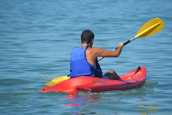 Sports, paddling the canoe Stock Photo