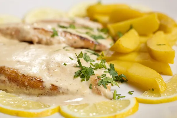 Chicken steak with sause and potatoes — Stock Photo, Image