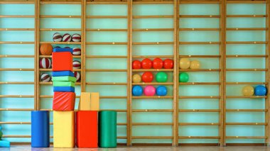 Tıbbi topları ve spor aletleri olan kocaman tahta bir merdiven.