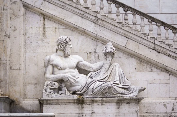 Antique statue on bottom of Victor Emmanuel II — Stock Photo, Image