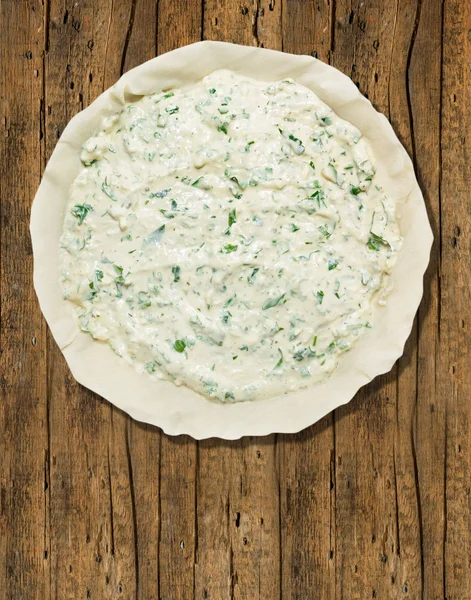 Spinach and Cheese  Burek, filo pastry,  preparation  on old wood table, vertical. — Stock Photo, Image