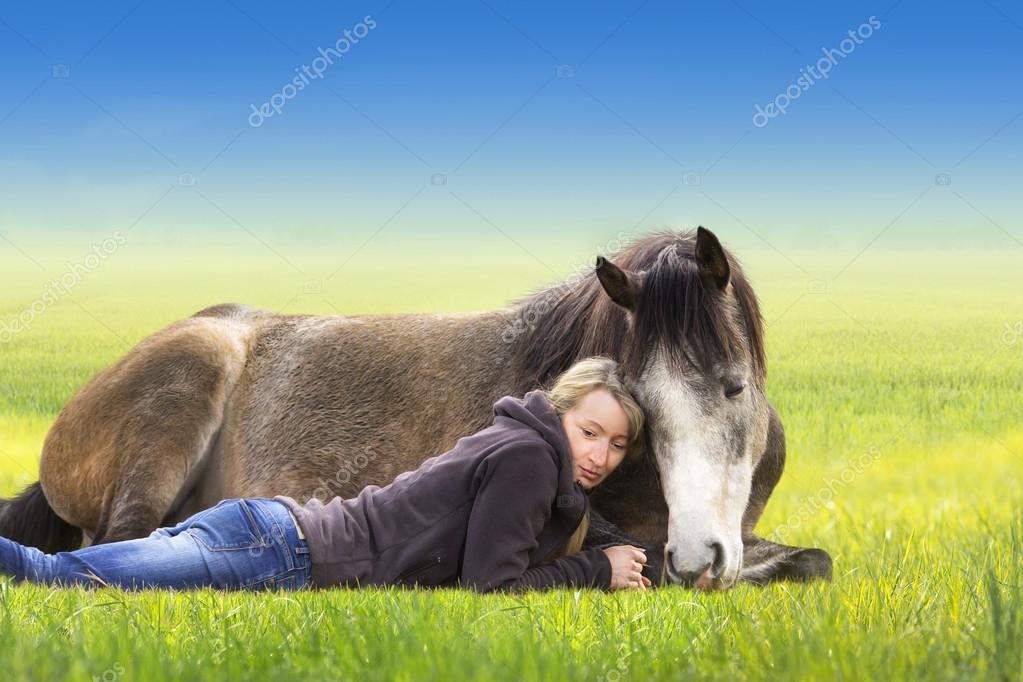 depositphotos_42241965-stock-photo-girl-and-horse-lying-and.jpg