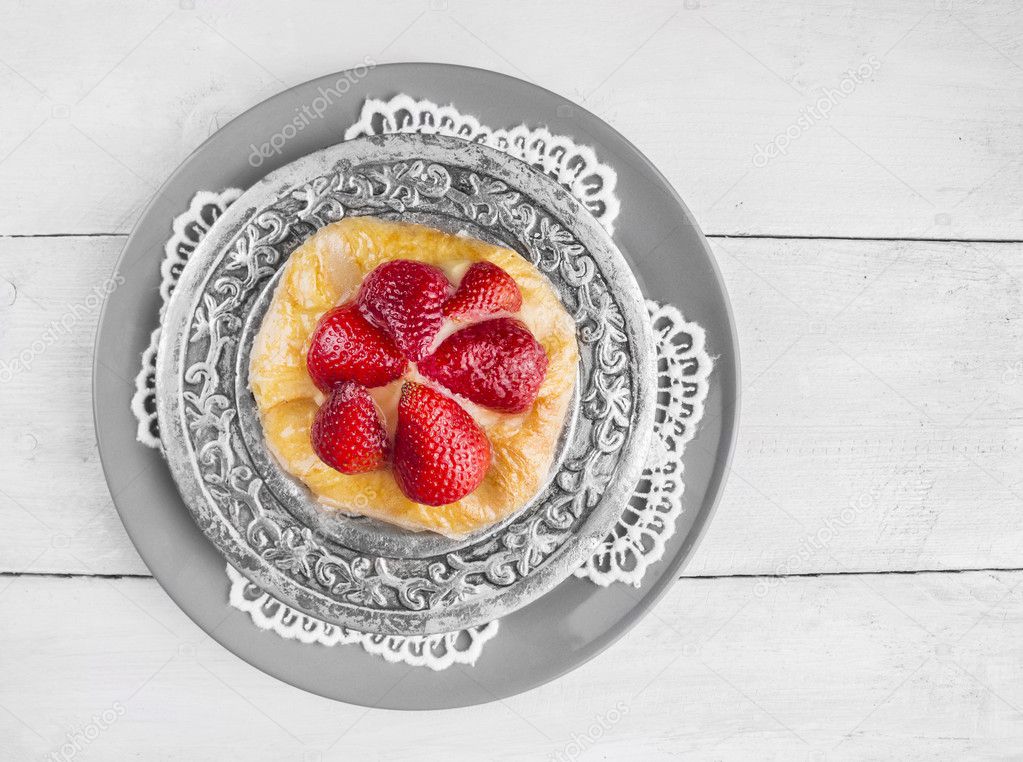 Strawberry cake on silver platter