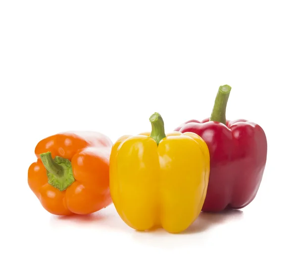 Sweet peppers, yellow, red and orange paprika on white background — Stock Photo, Image