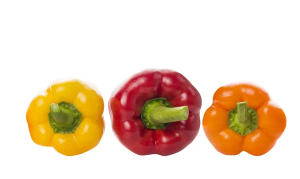 Tricolor paprika peppers , top view, isolated — Stock Photo, Image