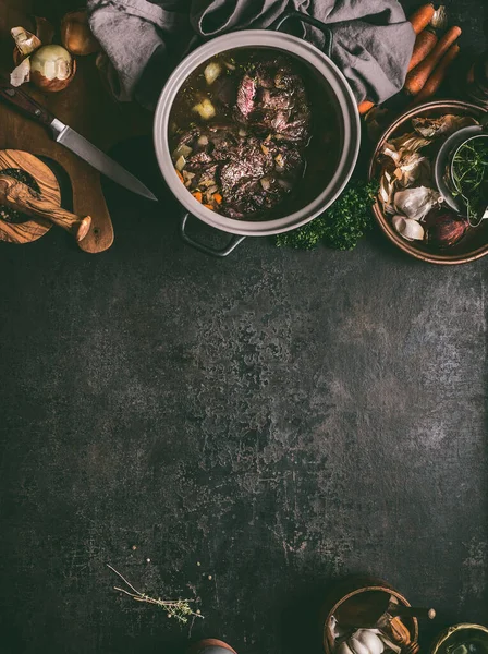 Food Background Stewed Beef Meat Cooking Pot Dark Table Herbs — Stockfoto