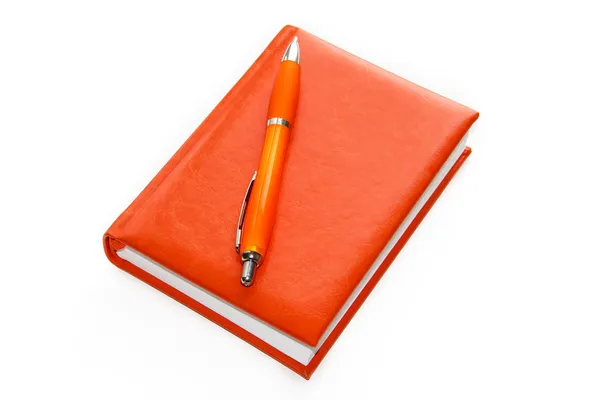 Notizbuch und Stift Stockbild