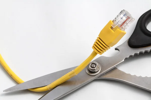 Scissors cutting cable — Stock Photo, Image