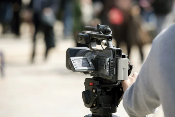 Covering an event with a video camera — Stock Photo, Image