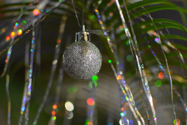 New Year Festive Green Background Shiny Silver Ball Ribbon Decorations — 图库照片