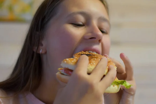 Girl Appetite Eats Delicious Hamburger Child Bites Large Piece Sandwich — Zdjęcie stockowe