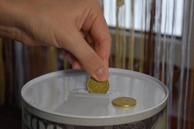 save money in case. put money in a bank piggy bank