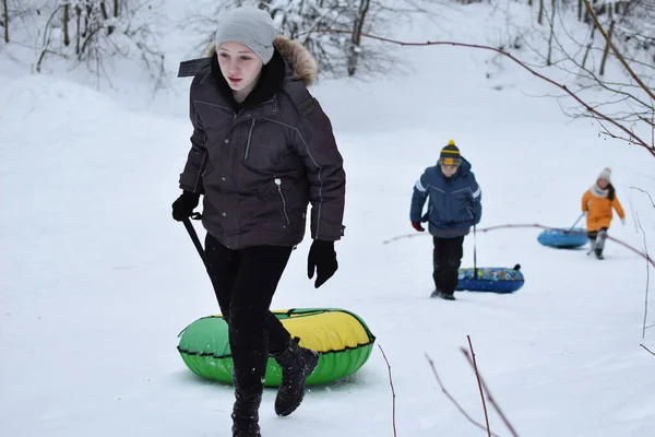 Cheerful Children Winter Holidays Children Snow Slides — стоковое фото