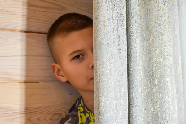Boy Hiding Curtain Child Overhears Conversation — стоковое фото