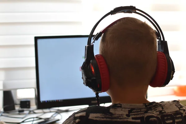 Boy Looks Computer Monitor Child Plays Online Games Distance Learning — Stockfoto