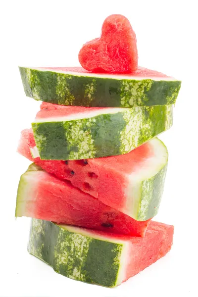 Segment van verse rode watermeloen met hart geïsoleerd op wit — Stockfoto