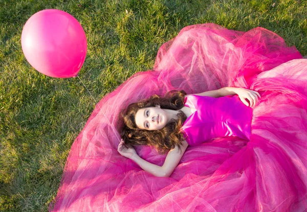 Girl with pink balloons — Stock Photo, Image