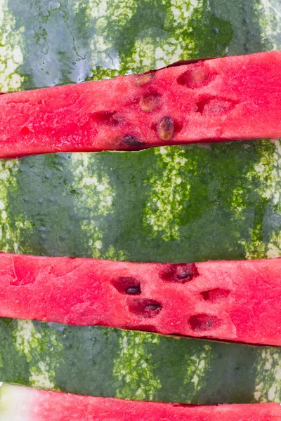 Slice of fresh red watermelon with heart isolated on white — Stock Photo, Image