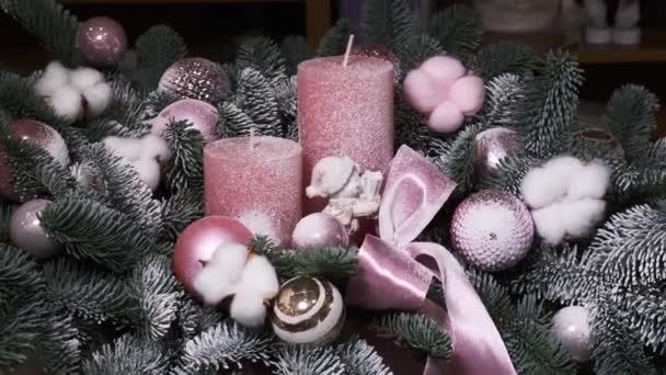 Rotating Christmas Eve Composition Red Toys Balls Ribbon Bow Candles — Video