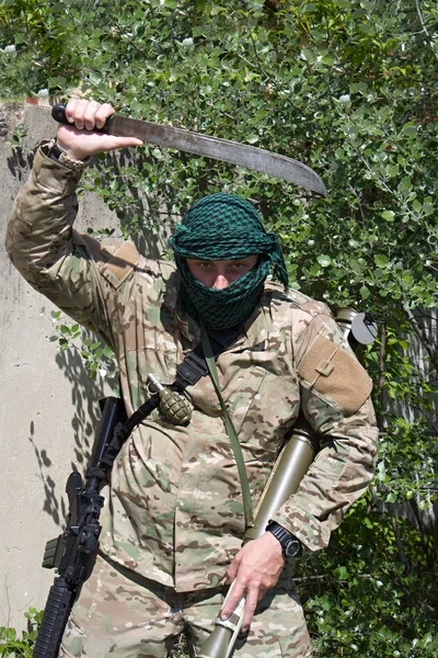 Armed terrorist, freedom fighter, a masked killer — Stock Photo, Image