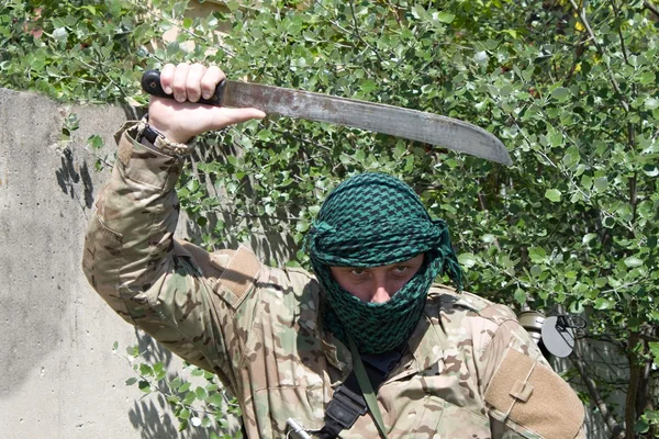 Armed terrorist, freedom fighter, a masked killer — Stock Photo, Image