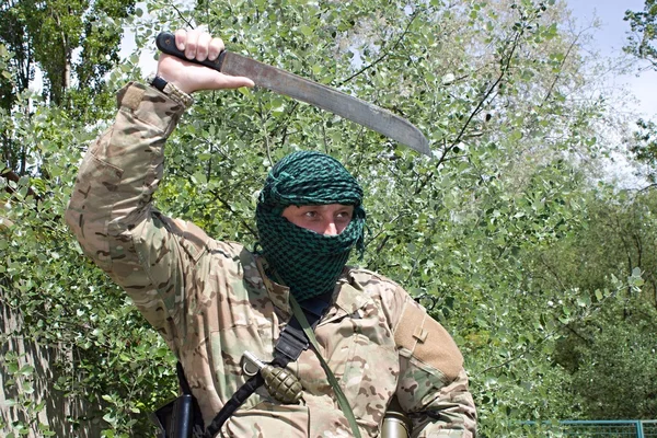 Armed terrorist, freedom fighter, a masked killer — Stock Photo, Image