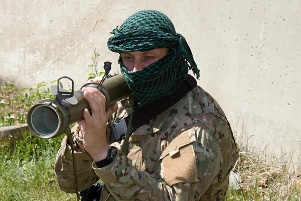 Armed terrorist, freedom fighter, a masked killer — Stock Photo, Image