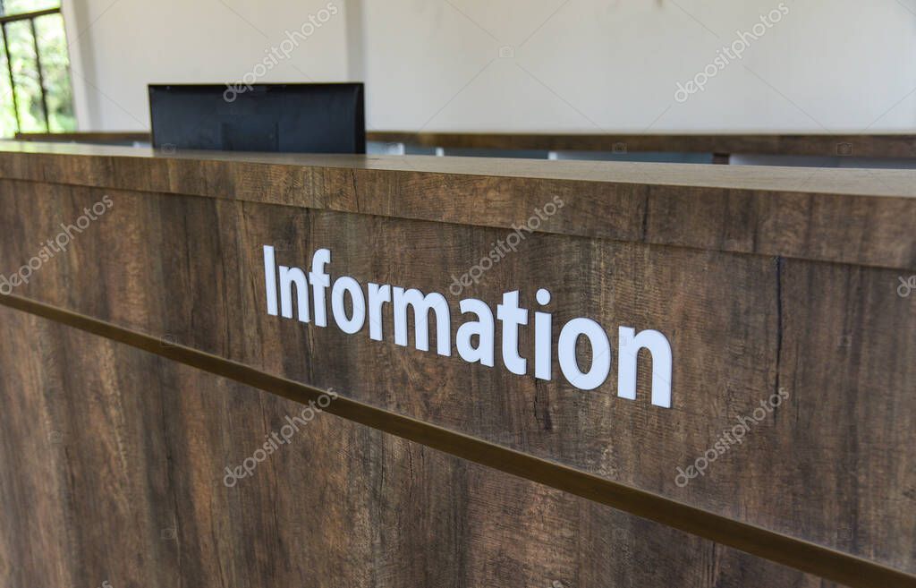 Counter information, text information on wooden table in the  office building