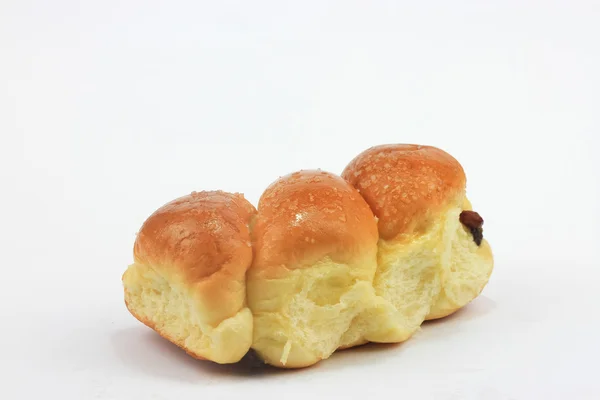Pão com passas e açúcar isolado sobre fundo branco — Fotografia de Stock
