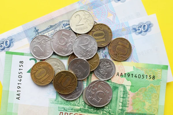 Money Russia Banknotes Coins Yellow Background Close Russian Rubles Various — Fotografia de Stock