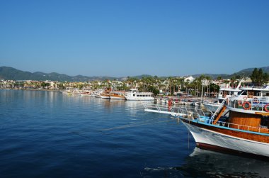 Some yachts in port on a trick