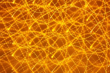 an abstraction of yellow lights. festive background.