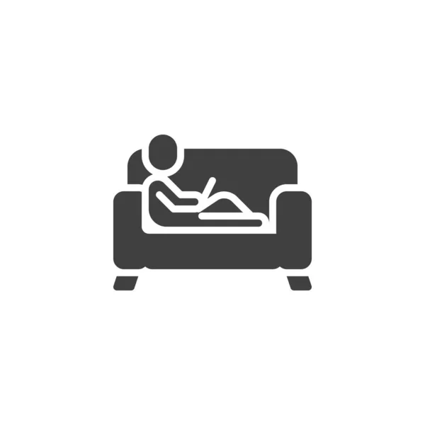 Man with laptop on the sofa vector icon — Stock Vector