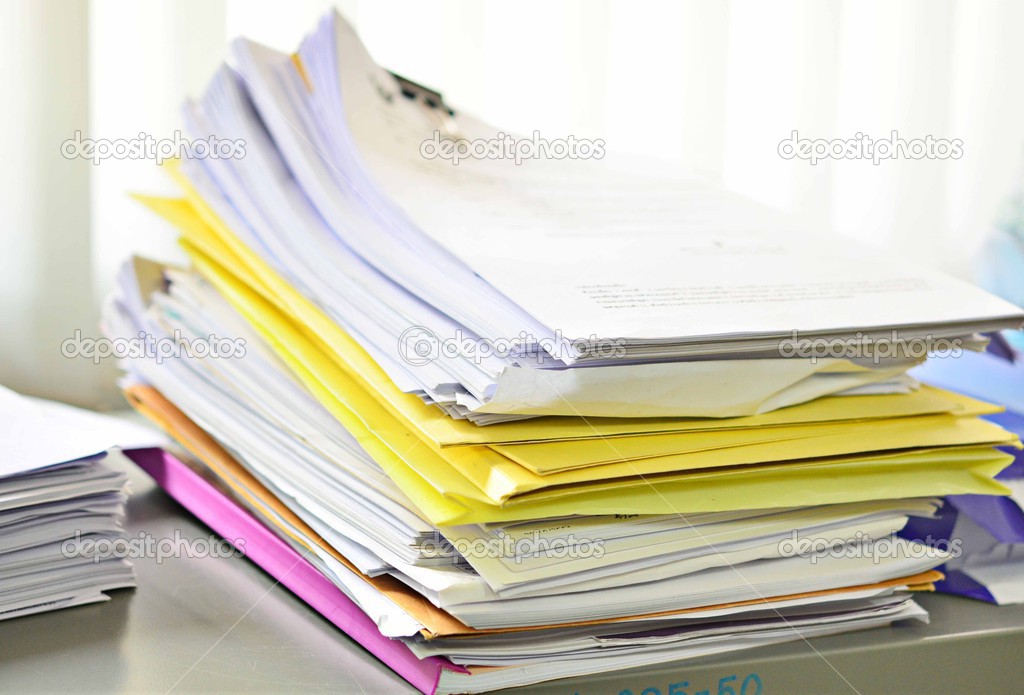 Stack of folders isolated on white background