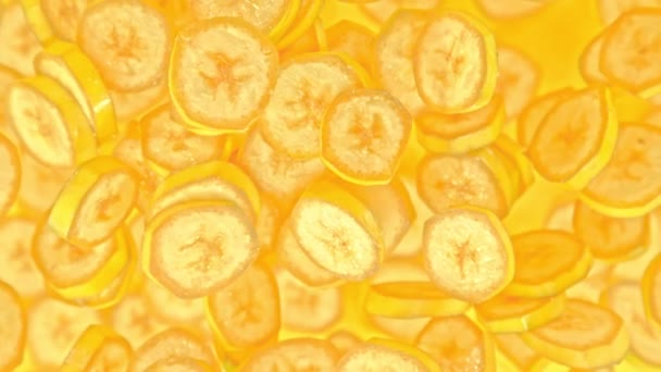 Super Slow Motion Shot Fresh Banana Slices Yellow Background Flying — 비디오