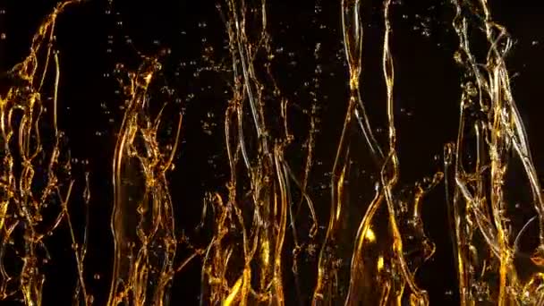 Super Slow Motion Shot Splashing Golden Oil Black Background 1000Fps — Stock Video