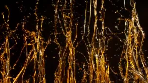 Super Slow Motion Shot Splashing Golden Oil Black Background 1000Fps — Stock Video