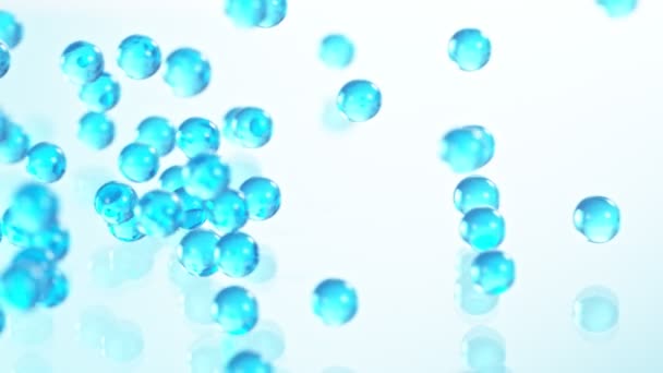 Super Slow Motion Shot Blue Hydrogel Balls Bouncing Glass 1000Fps — Stock Video