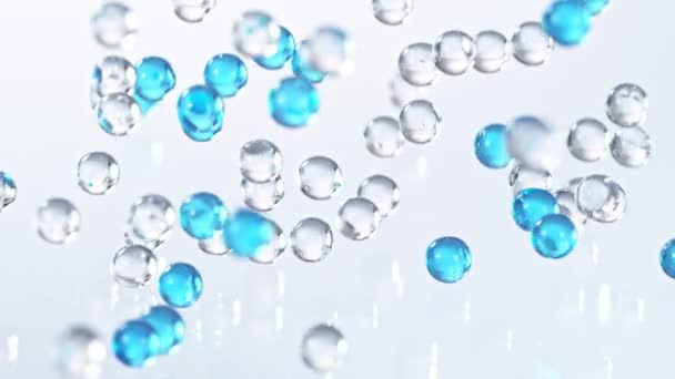 Super Slow Motion Shot Blue Transparent Hydrogel Balls Bouncing Glass — Stock Video
