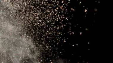 1000 fps hızla Kahverengi Makyaj Tozu Patlaması Süper Yavaş Çekimi. 4K 'da Yüksek Hız Sinema Kamerası ile çekildi.