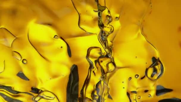 Super Slow Motion Shot Splashing Golden Oil Waves Prędkością 1000 — Wideo stockowe