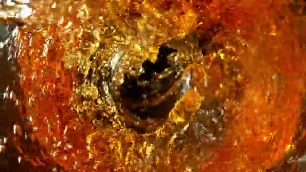 Super Slow Motion Shot Van Golden Alcohol Liquid Spin Glass — Stockvideo